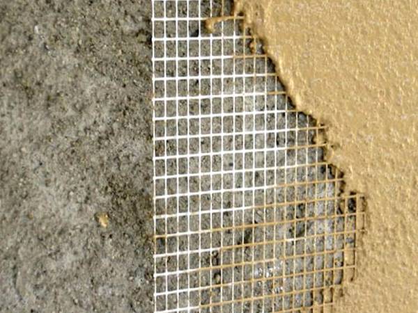 A wall is plastering with fiberglass mesh as the exterior wall waterproof structure.